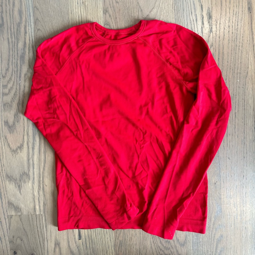 Red stretchy long sleeve athletic shirt